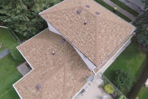A bird 's eye view of a house with a roof that has been cleaned.