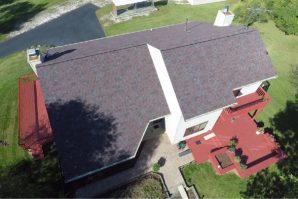 A bird 's eye view of a house with purple roof.